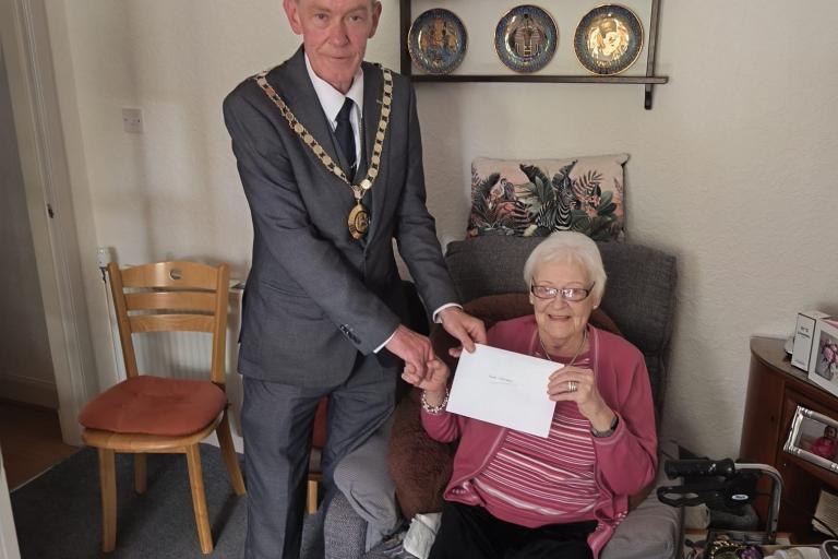 Photograph of Annie Chalmers and Council Convener Kenneth Macleod