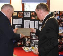 Convenor presenting plaque